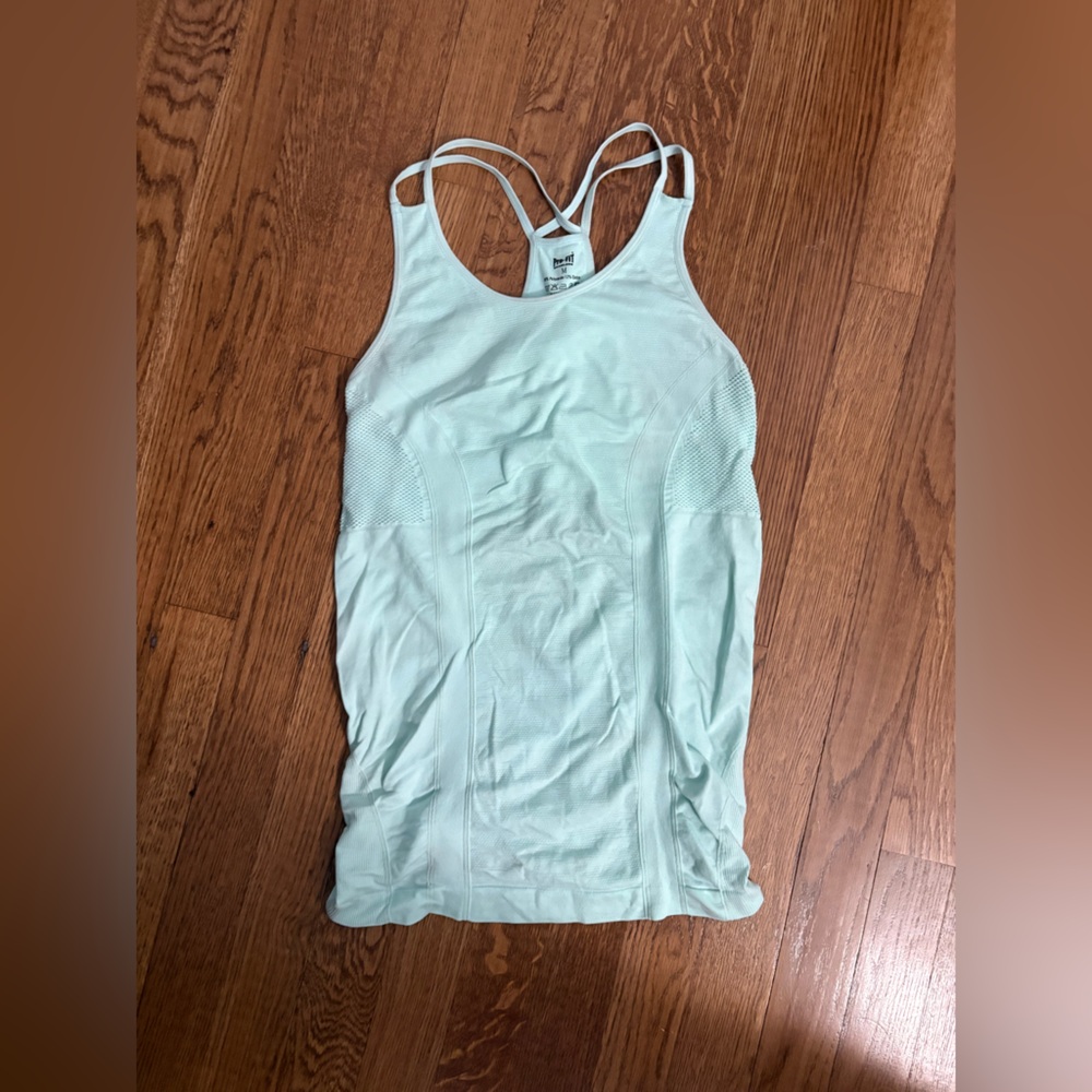 Light aqua workout tank with built in bra